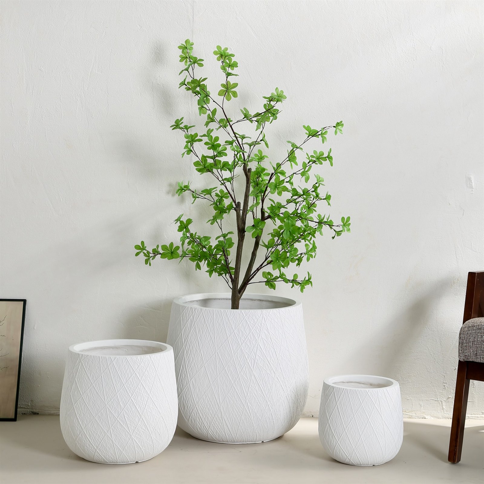 White crosshatch texture fiberglass planter set in three sizes